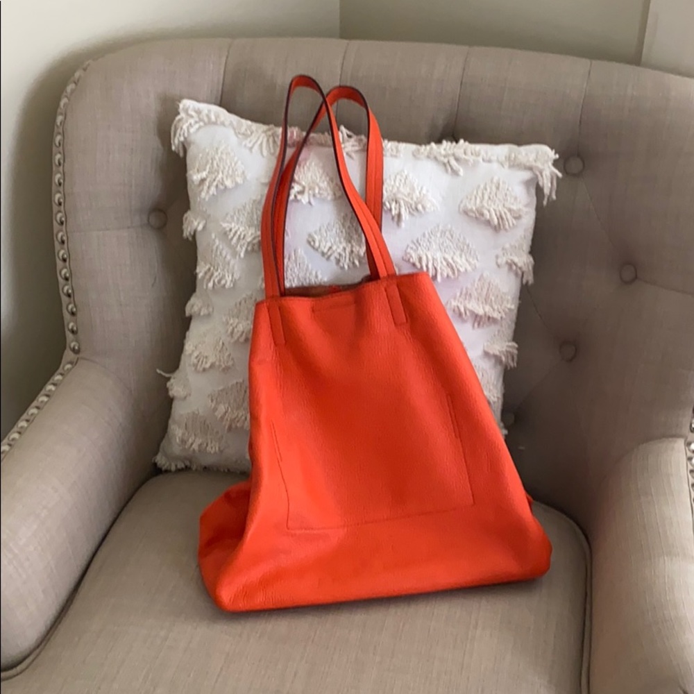Bright orange leather tote/purse.